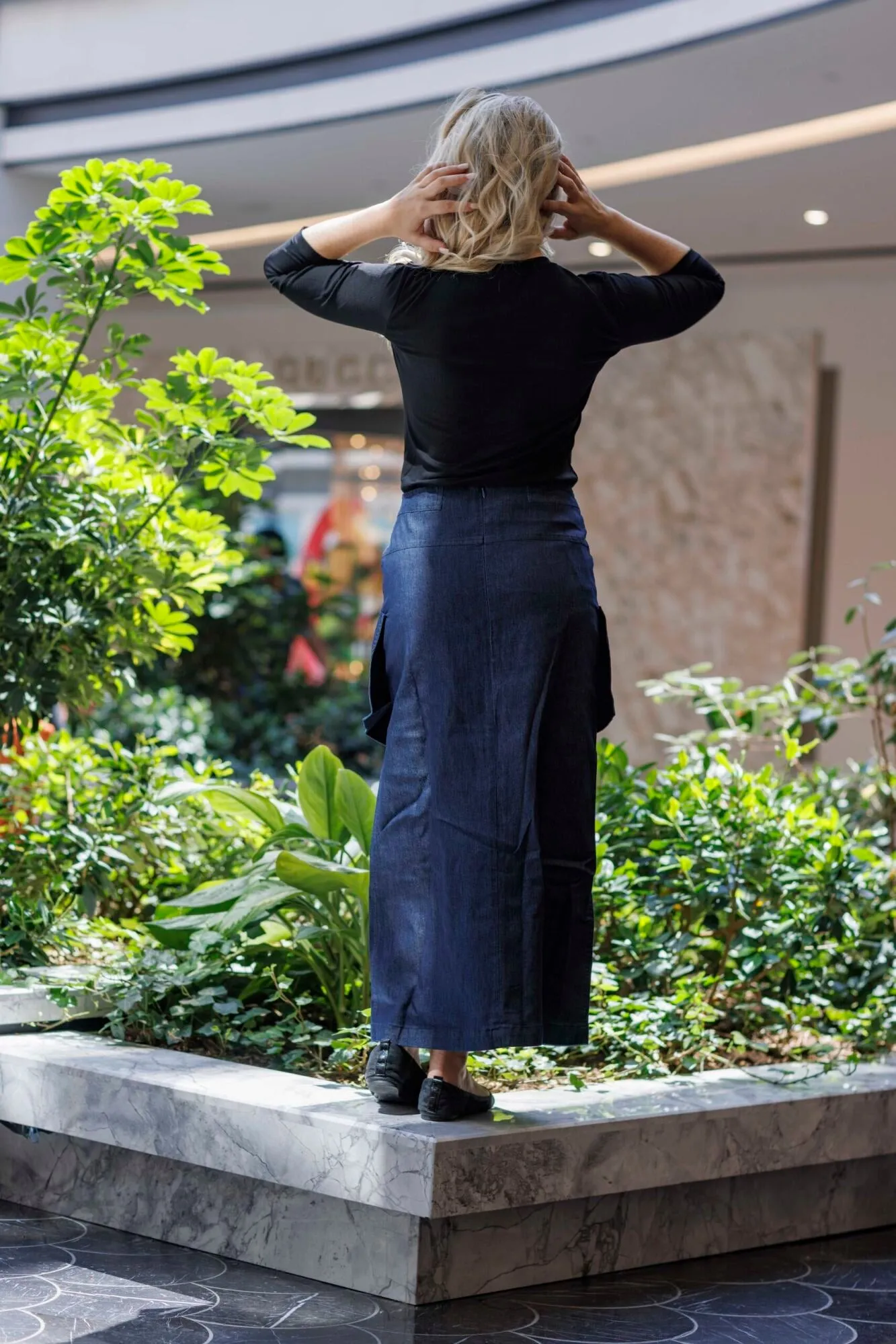 STRETCH DENIM MIDI SKIRT WITH OUTISDE POCKETS